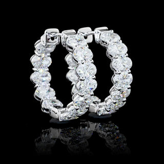 East-West oval lab-grown diamond hoop earrings, 5 carats total weight, 19mm size, inside-out design, white gold setting.