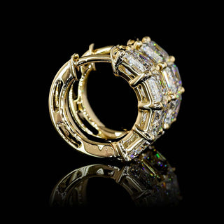 East-west emerald lab-grown diamond huggie earrings with 4 carats total weight, yellow gold, 8-piece set, 15.6mm diameter.