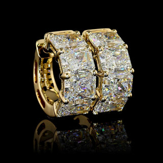 East-West radiant lab-grown diamond huggie earrings, 4 CTW, 15.6mm size, 8-piece yellow gold design with sparkling stones.