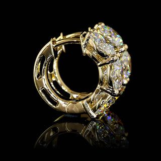 Lab-grown diamond huggie earrings with 4.5 carats total, round 3-stone design, 16.5mm size, 6-piece set in yellow gold.