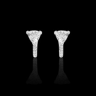 Lab grown diamond huggie earrings with trillion and pave designs, 1.5 carats total weight in white gold.