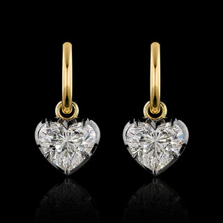 A pair of yellow gold huggie earrings with 2 carat each heart lab grown diamond drops in a georgian bezel-prong setting with black rhodium. || #total carat weight_4