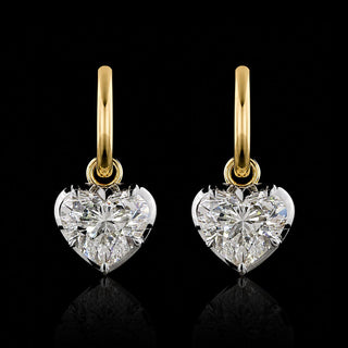 A pair of yellow gold huggie earrings with 2 carat each heart lab grown diamond drops in a white gold georgian bezel-prong setting. || #total carat weight_4