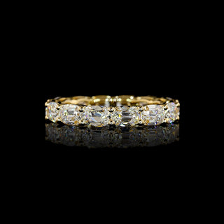 Lab-grown 3.5 ct tw antique cushion diamond eternity band in yellow gold, size 6.25, with east-west setting and 14 diamonds.