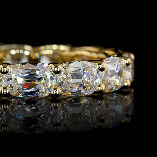 14-karat yellow gold eternity band with 3.5 carats total weight of antique cushion-cut lab-grown diamonds in east-west setting, size 6.25.
