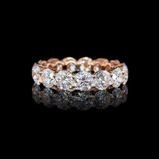 Round lab-grown diamond eternity band with 5-carat total weight, set in platinum, featuring a continuous circle of sparkling stones.