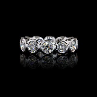 Round bezel lab-grown diamond eternity band with 5 carats total weight, 12 sparkling diamonds, size 6.5, white gold finish.