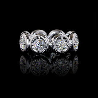 Round lab grown diamond eternity band in 14k yellow gold with a puffy bezel setting, 2 carats total weight. || #metal_white gold