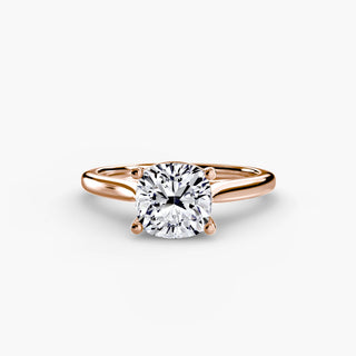 Cathedral solitaire engagement ring setting in rose gold, featuring a cushion-cut lab grown diamond. || #metal_rose gold #diamond shape_cushion
