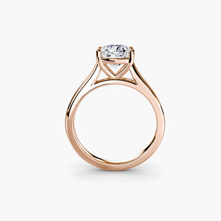 Cathedral solitaire engagement ring setting in rose gold, side profile view, featuring a cushion-cut lab grown diamond. || #metal_rose gold #diamond shape_cushion