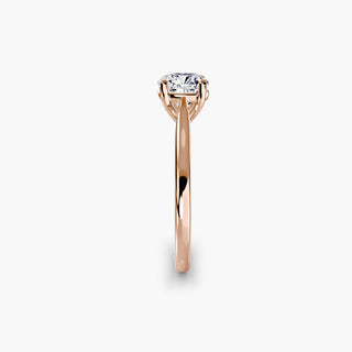 Cathedral solitaire engagement ring setting in rose gold showing the tapered band profile, with a cushion-cut lab grown diamond. || #metal_rose gold #diamond shape_cushion