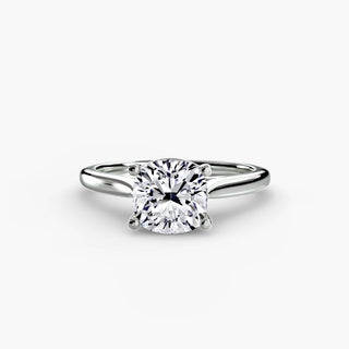 Cathedral solitaire engagement ring setting in white gold, featuring a cushion-cut lab grown diamond. || #metal_white gold|platinum #diamond shape_cushion