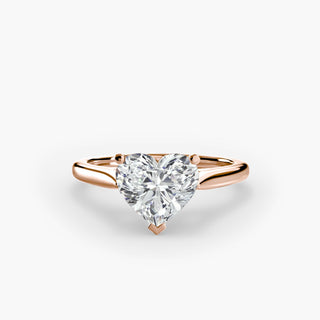 Cathedral solitaire engagement ring setting in rose gold, featuring a heart-shaped lab grown diamond. || #metal_rose gold #diamond shape_heart