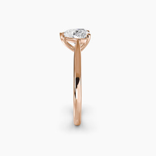 Cathedral solitaire engagement ring setting in rose gold showing the tapered band profile, with a heart-shaped lab grown diamond. || #metal_rose gold #diamond shape_heart