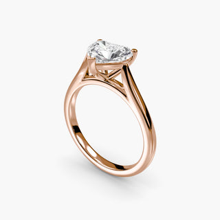 Cathedral solitaire engagement ring setting in rose gold with a heart-shaped lab grown diamond, three-quarter view. || #metal_rose gold #diamond shape_heart