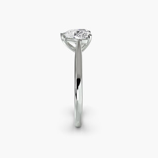 Cathedral solitaire engagement ring setting in white gold showing the tapered band profile, with a heart-shaped lab grown diamond. || #metal_white gold|platinum #diamond shape_heart