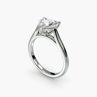 Cathedral solitaire engagement ring setting in white gold with a heart-shaped lab grown diamond, three-quarter view. || #metal_white gold|platinum #diamond shape_heart