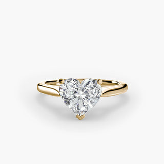 Cathedral solitaire engagement ring setting in yellow gold, featuring a heart-shaped lab grown diamond. || #metal_yellow gold #diamond shape_heart