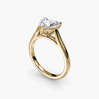 Cathedral solitaire engagement ring setting in yellow gold with a heart-shaped lab grown diamond, three-quarter view. || #metal_yellow gold #diamond shape_heart