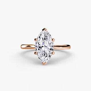 Cathedral solitaire engagement ring setting in rose gold, featuring a marquise-cut lab grown diamond. || #metal_rose gold #diamond shape_marquise