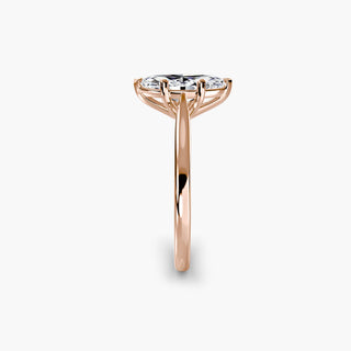 Cathedral solitaire engagement ring setting in rose gold showing the tapered band profile, with a marquise-cut lab grown diamond. || #metal_rose gold #diamond shape_marquise