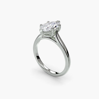 Cathedral solitaire engagement ring setting in white gold with a marquise-cut lab grown diamond, three-quarter view. || #metal_white gold|platinum #diamond shape_marquise