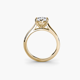 Cathedral solitaire engagement ring setting in yellow gold, side profile view, featuring a marquise-cut lab grown diamond. || #metal_yellow gold #diamond shape_marquise