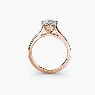 Cathedral solitaire engagement ring setting in rose gold, side profile view, featuring a pear-shaped lab grown diamond. || #metal_rose gold #diamond shape_pear