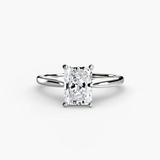 Cathedral solitaire engagement ring setting in white gold, featuring a radiant-cut lab grown diamond. || #metal_white gold|platinum #diamond shape_radiant