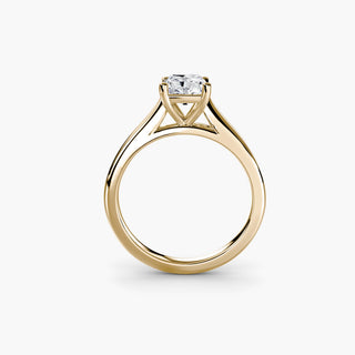 Cathedral solitaire engagement ring setting in yellow gold, side profile view, featuring a radiant-cut lab grown diamond. || #metal_yellow gold #diamond shape_radiant