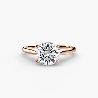 Cathedral solitaire engagement ring setting in rose gold, featuring a round lab grown diamond. || #metal_rose gold #diamond shape_round