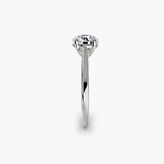 Cathedral solitaire engagement ring setting in white gold showing the tapered band profile, with a round lab grown diamond. || #metal_white gold|platinum #diamond shape_round