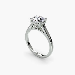 Cathedral solitaire engagement ring setting in white gold with a round lab grown diamond, three-quarter view. || #metal_white gold|platinum #diamond shape_round