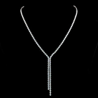 Oval lab-grown diamond lariat necklace with 14 carats total weight and 140 sparkling diamonds in white gold.