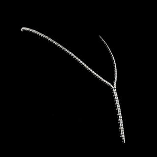 Round lab grown diamond lariat Y necklace with 20 carats total weight and 160 diamonds in white gold setting.