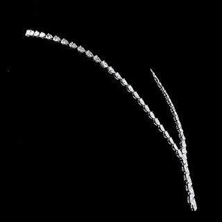 Double row pear-shaped lab-grown diamond lariat necklace with 30ct tw, 1ct center, 84 diamonds, 16-inch white gold chain.