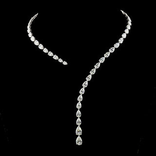Open lariat pear-shaped lab-grown diamond necklace with 35ctw center stones, 1.5ct each, 68 total diamonds, 15-inch white gold chain.