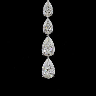 Open lariat necklace with pear-shaped lab-grown diamonds, 3.5 carats total, featuring 1.5-carat center stone, 68 diamonds, 15-inch white gold chain.