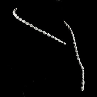 Open lariat pearl necklace with lab-grown diamonds, 1.5ct total weight, featuring a 35ctw center and 68 diamonds on a 15-inch white gold chain.