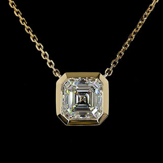 14K yellow gold Asscher lab-grown diamond bezel solitaire pendant necklace featuring a 1.5-carat Asscher cut diamond.