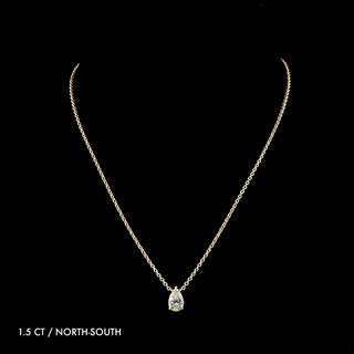 Pear-shaped 1.5ct lab-grown diamond solitaire pendant necklace in yellow gold with a sleek, elegant design.