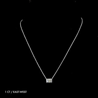 Radiant lab-grown diamond bezel solitaire pendant necklace with 1.0 carat white gold chain and diamond pendant.
