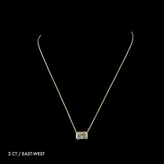 Radiant lab-grown diamond bezel solitaire pendant necklace with a 2-carat yellow gold chain, featuring a sparkling radiant-cut diamond.