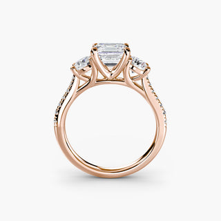 LabGrownDiamonds.com three-stone cathedral pavé engagement ring setting with asscher cut accents, featuring intricate metalwork and sparkling stones.