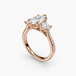 Three stone cathedral pave engagement ring setting with marquise-cut accents, featuring lab-grown diamonds from LabGrownDiamonds.com.
