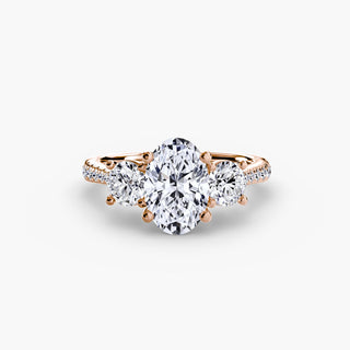 Three stone cathedral pave engagement ring setting with oval lab-grown diamonds, showcasing intricate metalwork and sparkling stones.