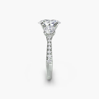 LabGrownDiamonds.com three-stone cathedral pavé engagement ring setting with oval center and side stones in white gold.