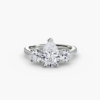 Three stone cathedral pavé engagement ring setting in white gold with pear-shaped lab-grown diamonds from LabGrownDiamonds.com.