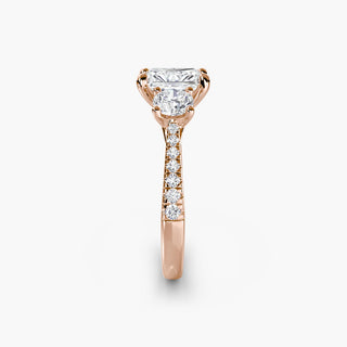 Three stone cathedral pavé engagement ring setting with radiant lab-grown diamonds, showcasing intricate metalwork and sparkling stones.
