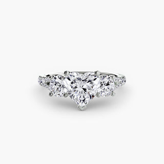 Three stone split shank pavé engagement ring setting in white gold with heart-shaped accents, showcasing detailed craftsmanship.